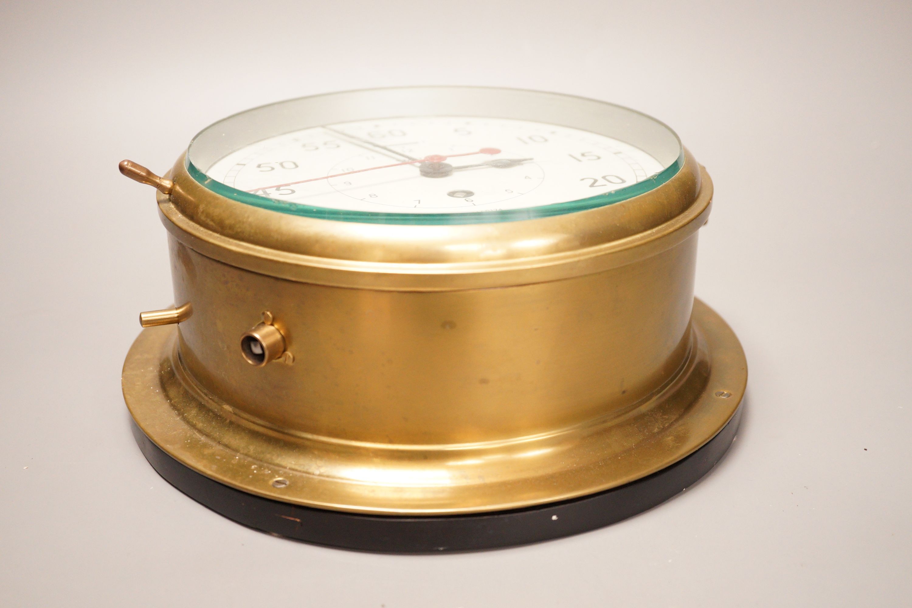 A Smiths Astral brass ships bulkhead timepiece, 27cm